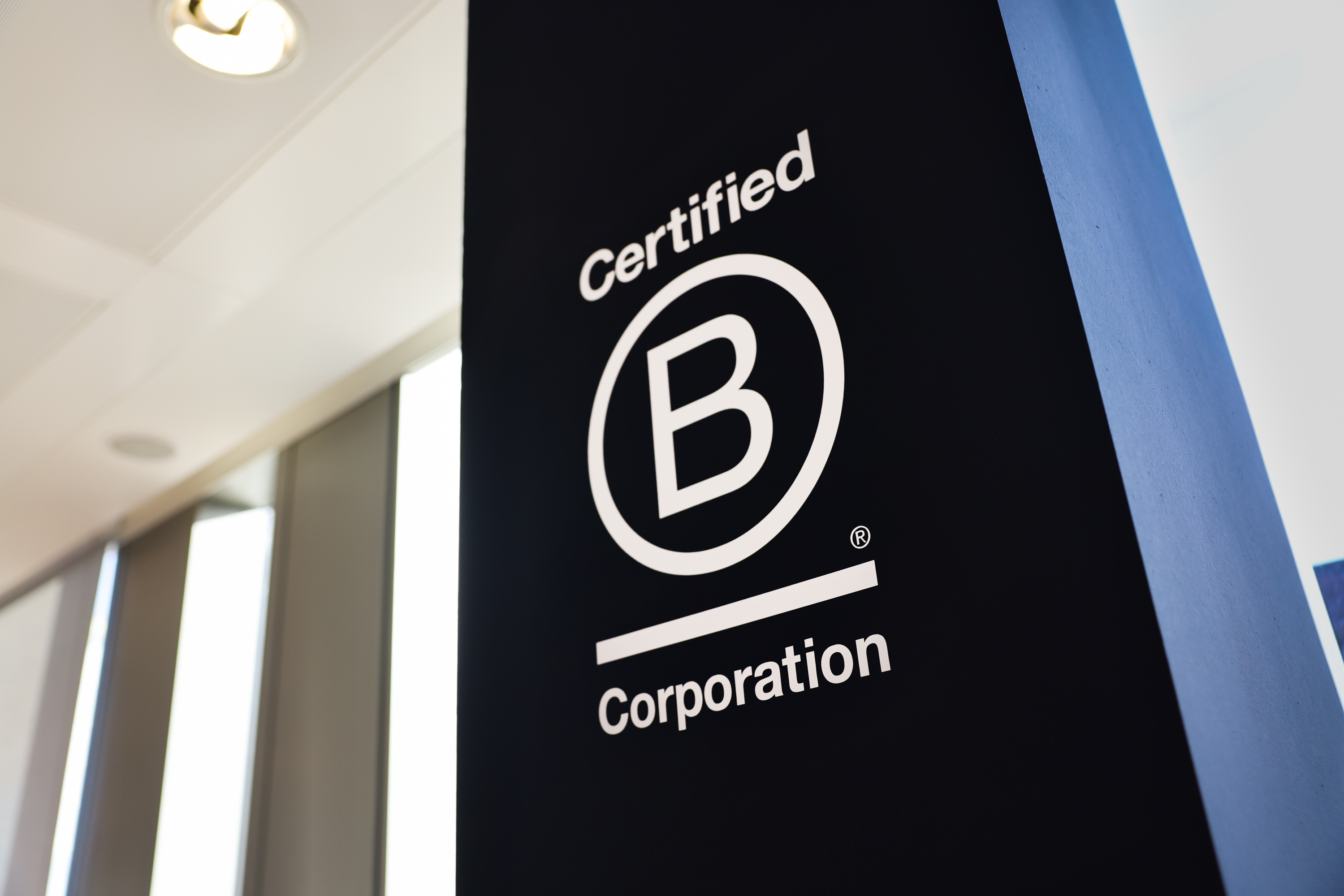 B Corp logo on a column